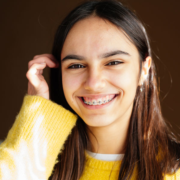 smiling girl with braces