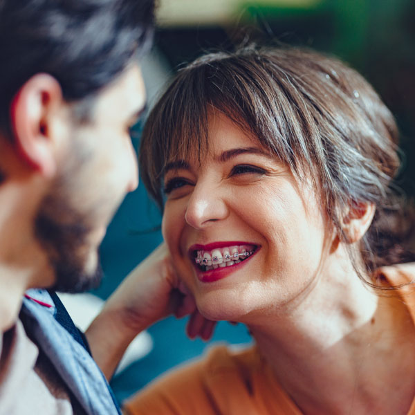 woman smiling with braces